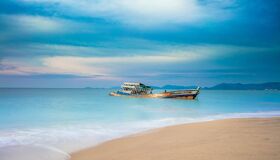 Old Boat on the Beach of Thailand